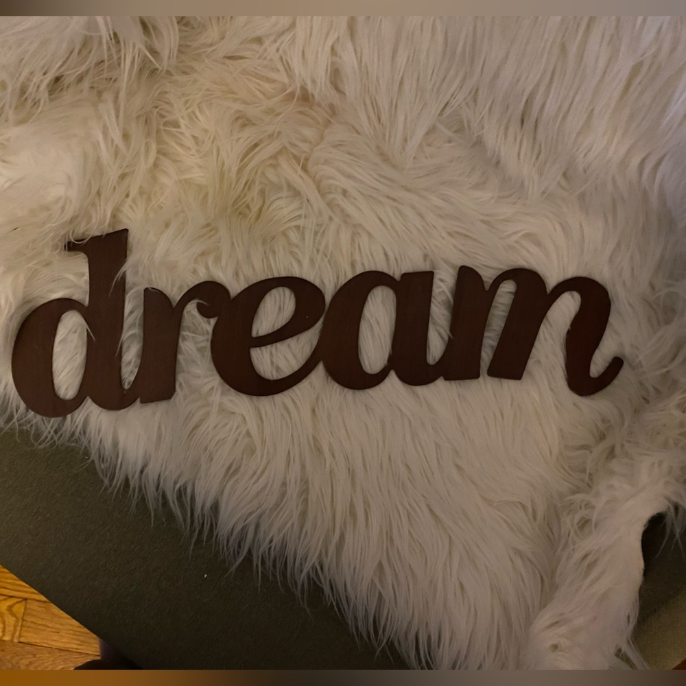 Word sign in metal.